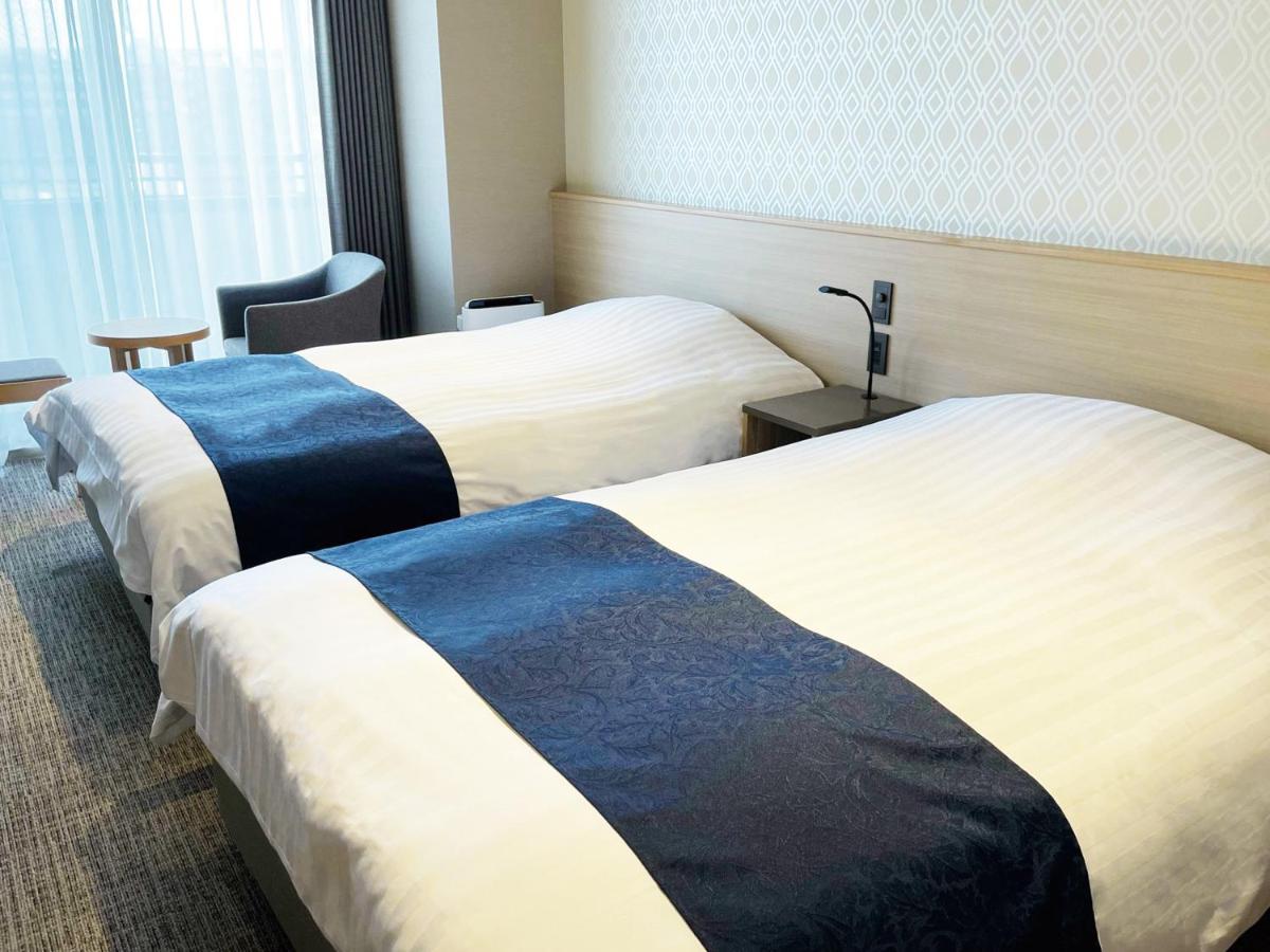 Hotel Abest Grande Такацуки Экстерьер фото